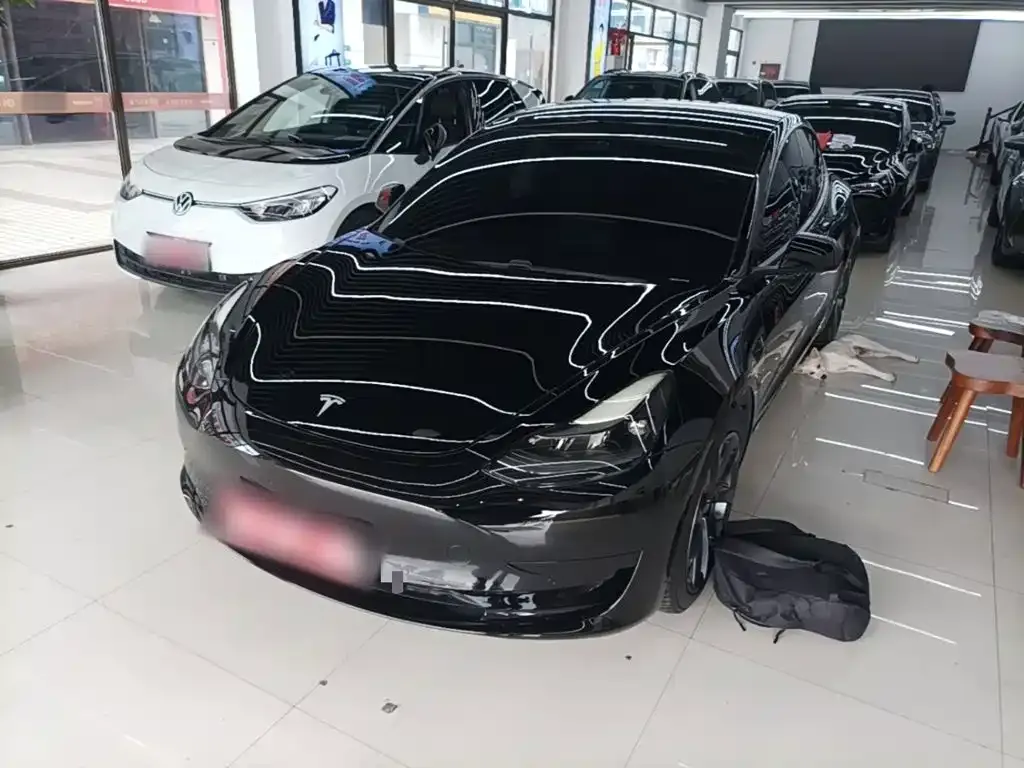 Tesla Model 3 — фото 10