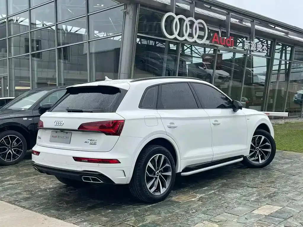 Audi Q5L — фото 6