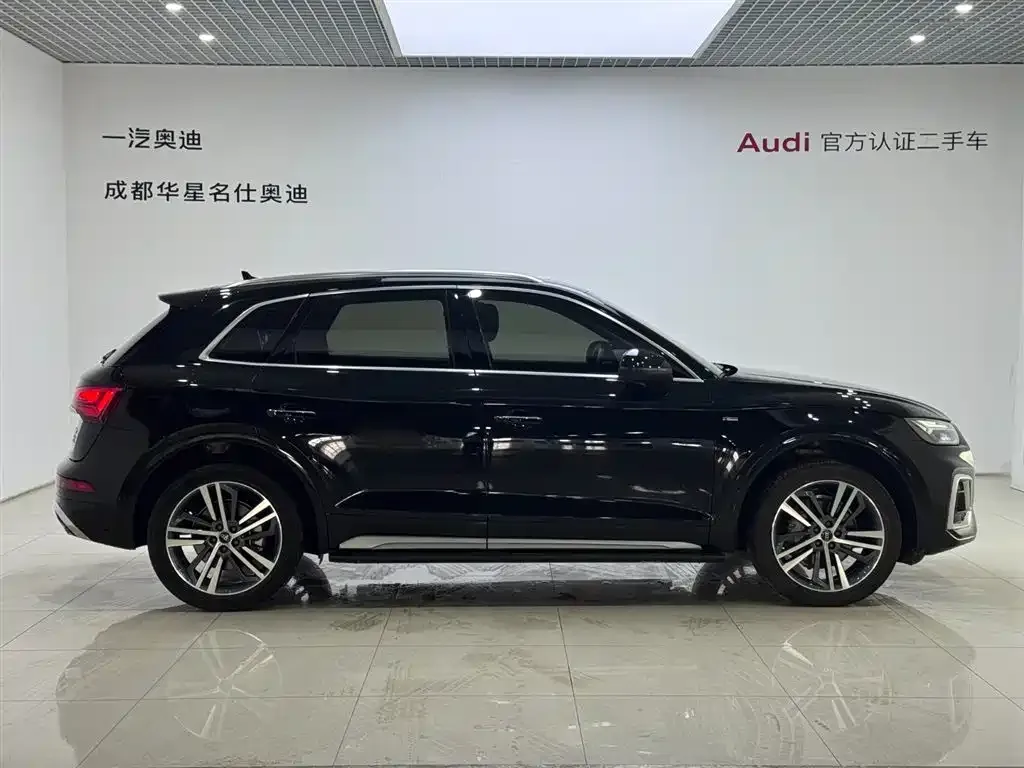 Audi Q5L — фото 7