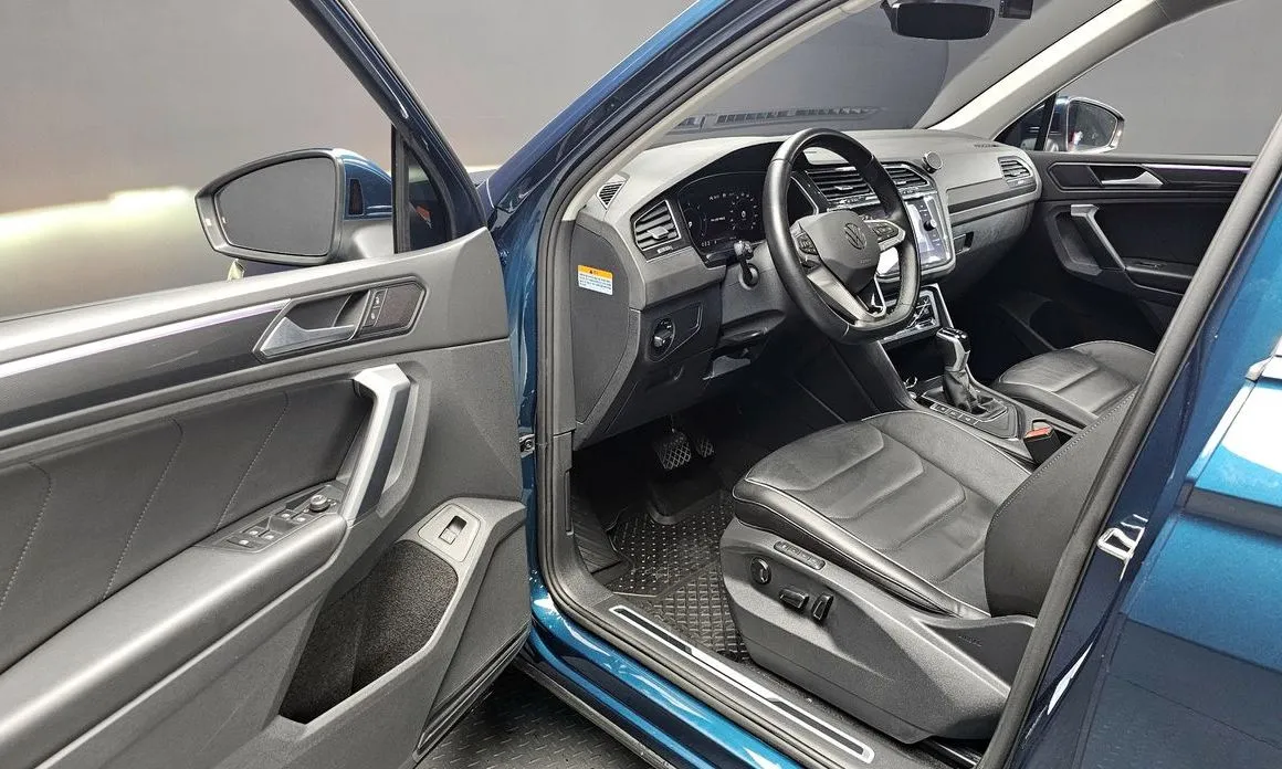 Volkswagen Tiguan — фото 6
