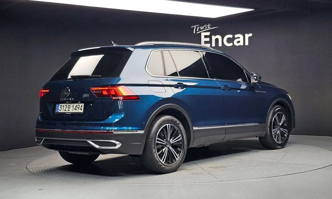 Volkswagen Tiguan — фото 8