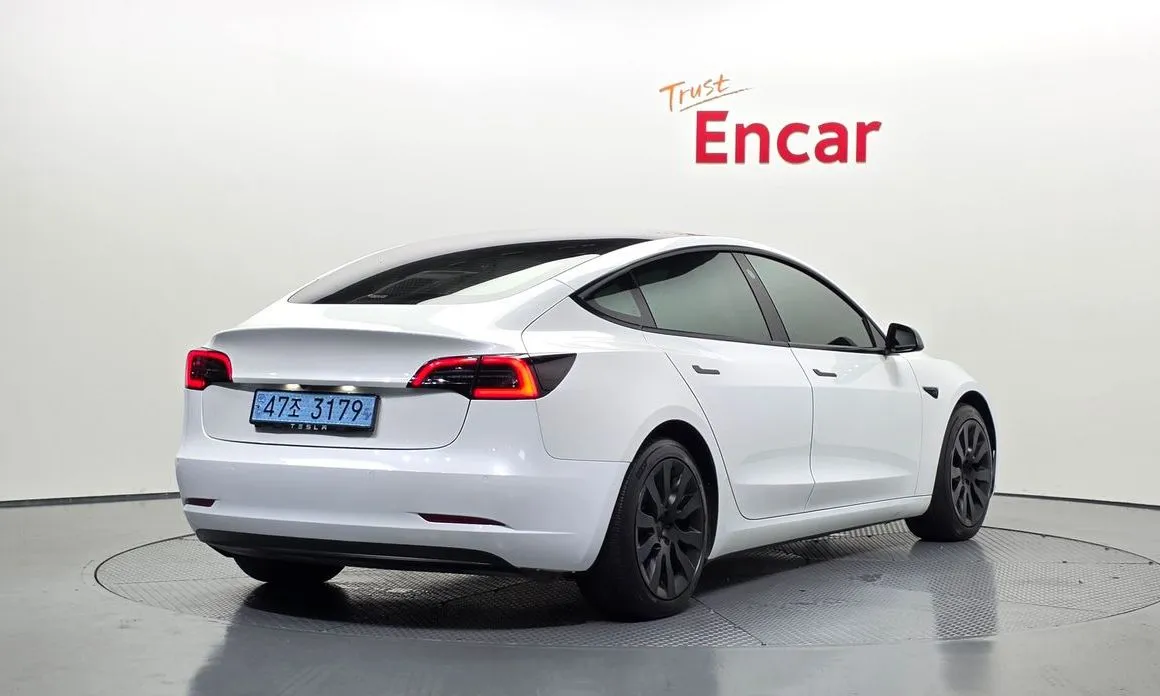 Tesla Model 3 — фото 7