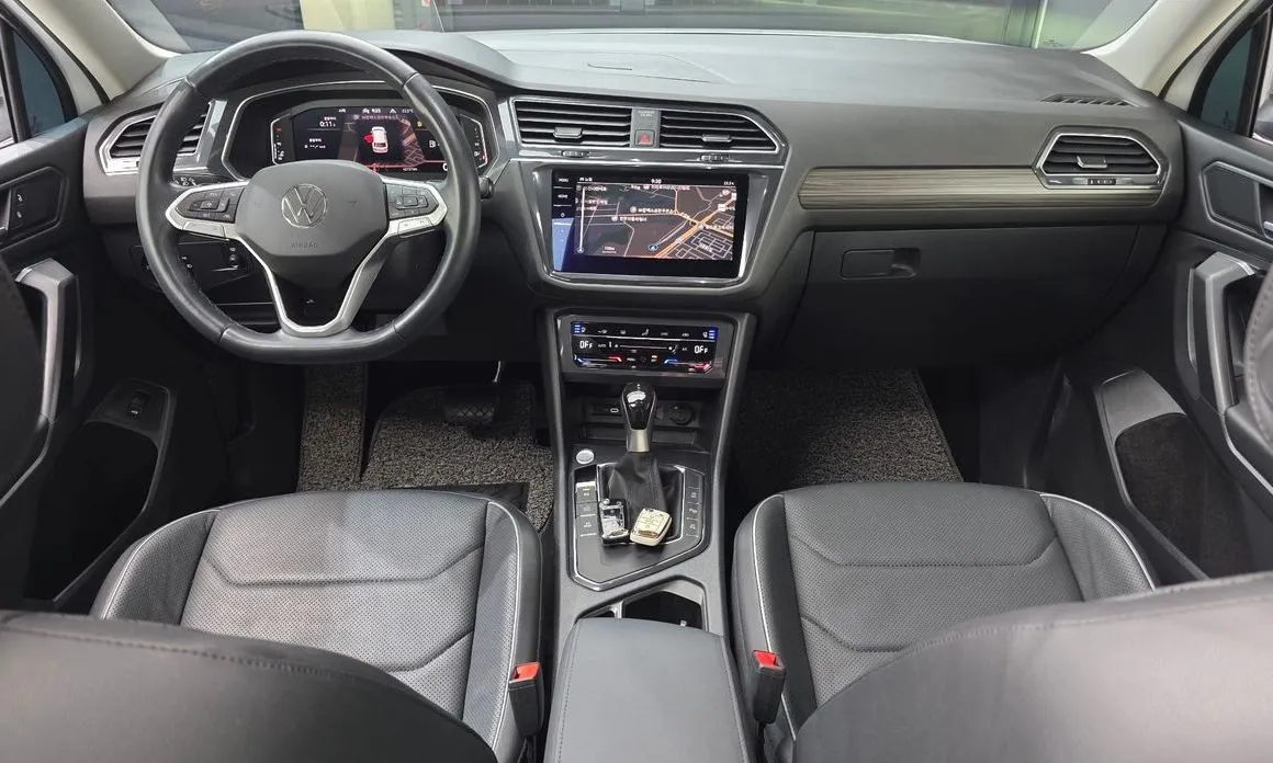 Volkswagen Tiguan — фото 10