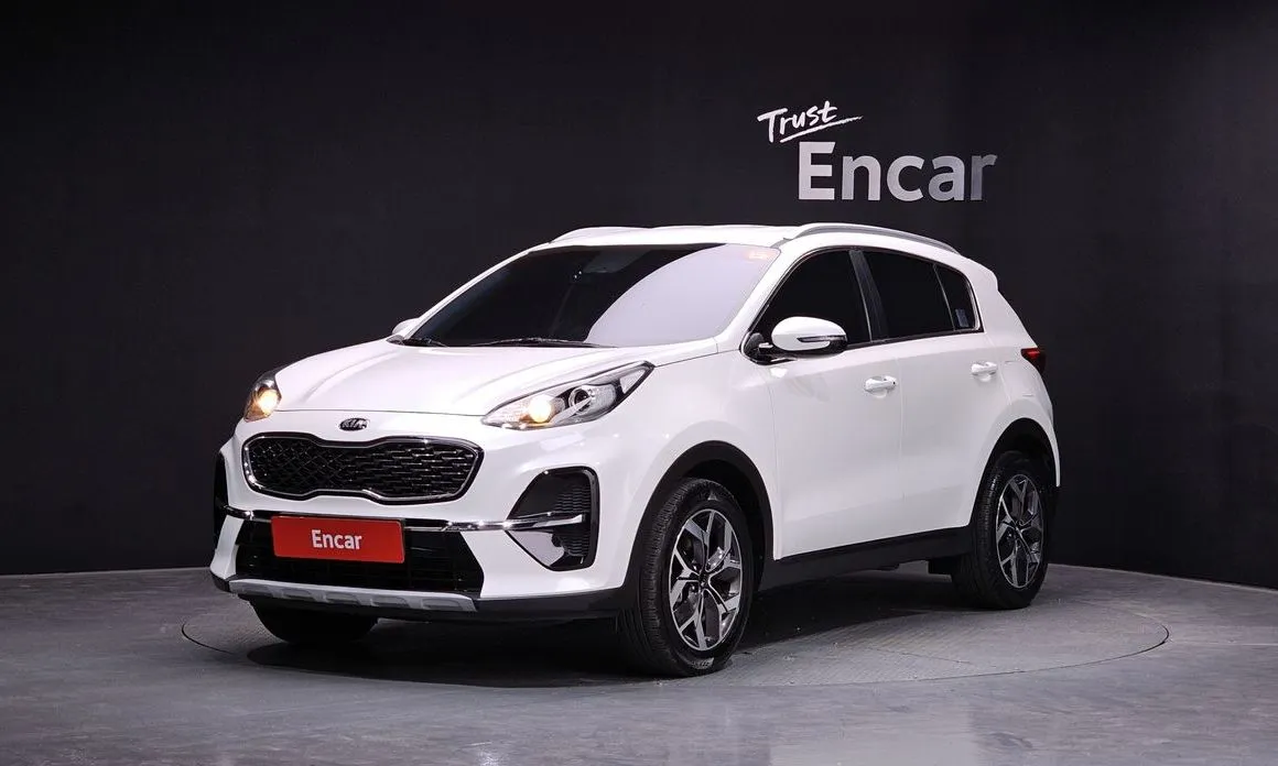 Kia Sportage — фото 1