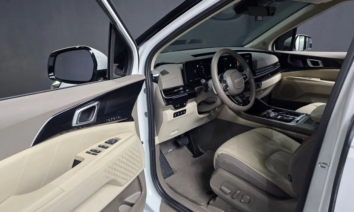 Kia Carnival — фото 10