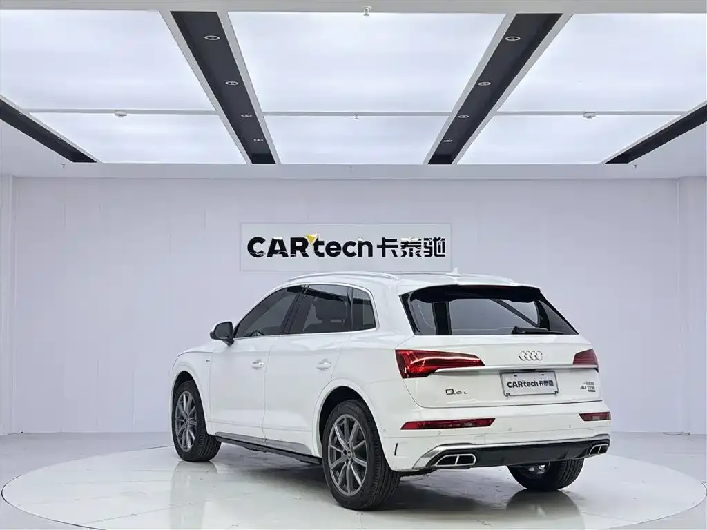 Audi Q5L — фото 10