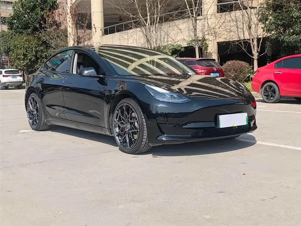 Tesla Model 3 — фото 9