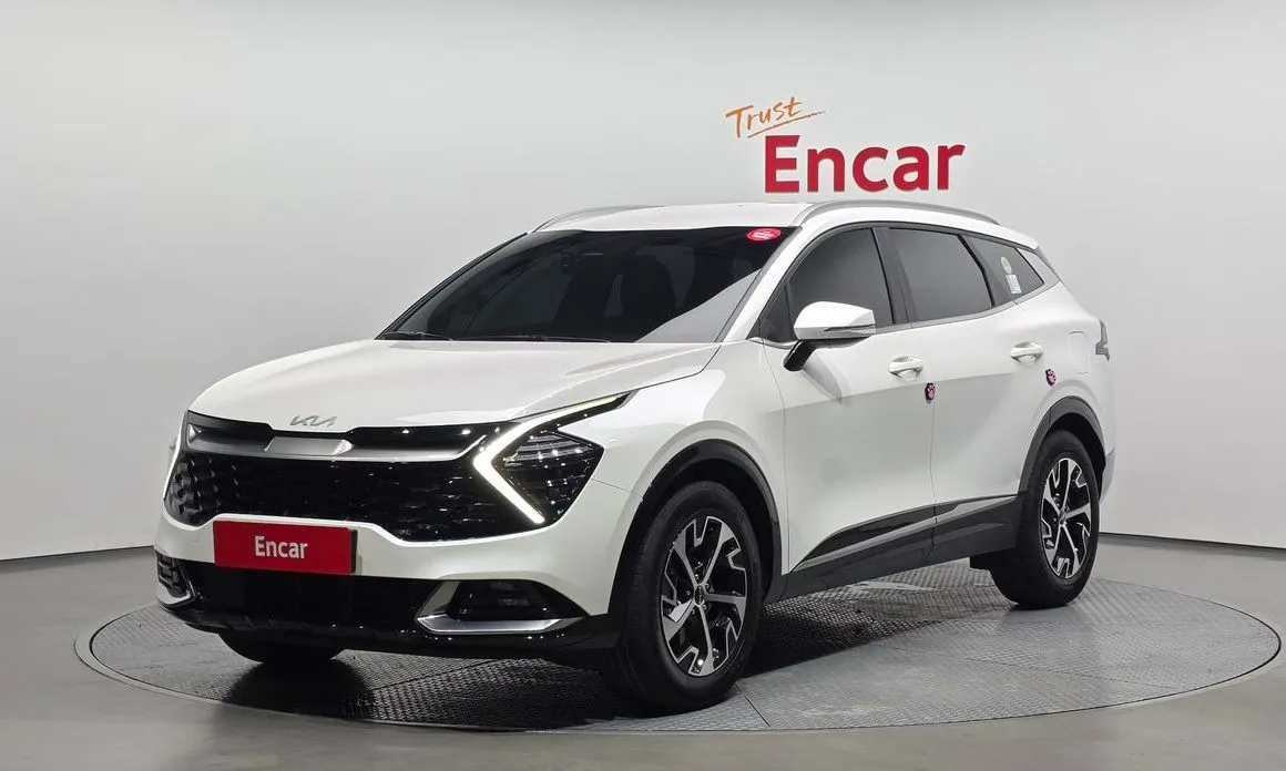 Kia Sportage — фото 1