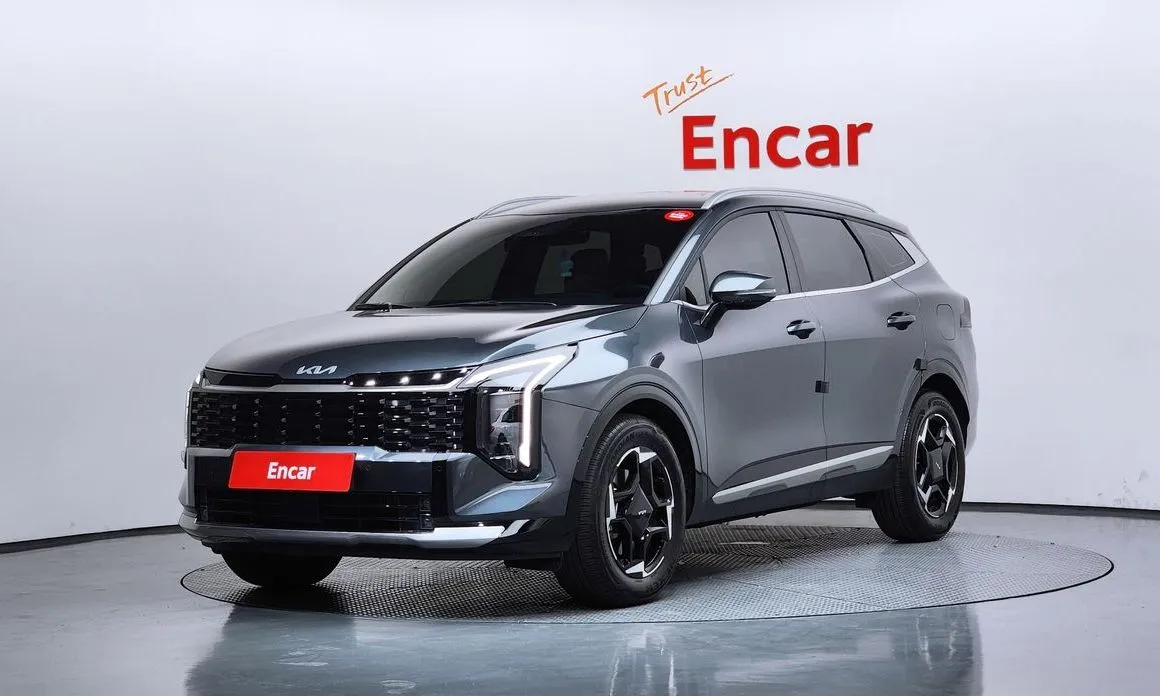 Kia Sportage — фото 1