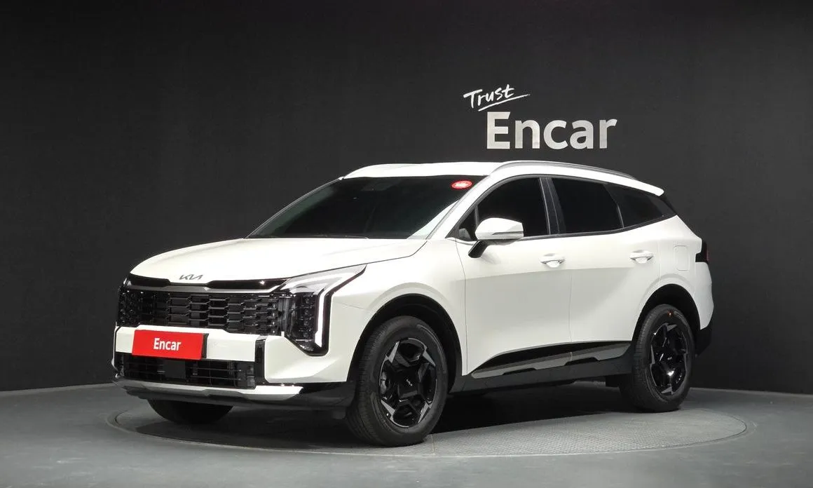 Kia Sportage — фото 1