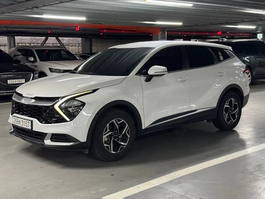 Kia Sportage — фото 7