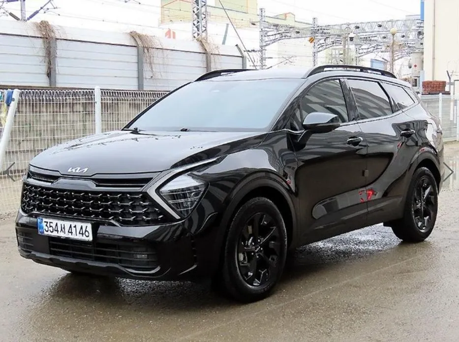 Kia Sportage — фото 1