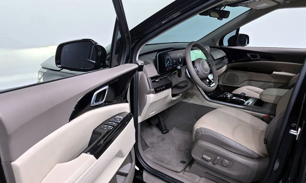 Kia Carnival — фото 10