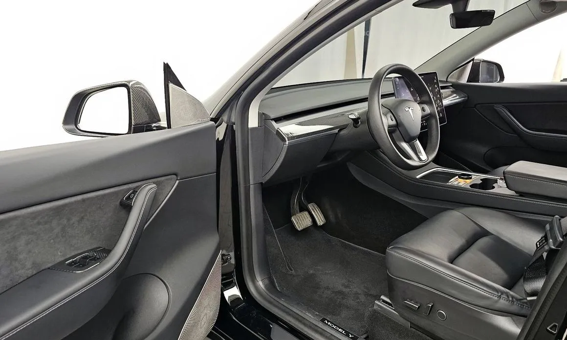 Tesla Model Y — фото 10