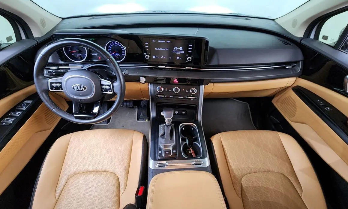 Kia Carnival — фото 10
