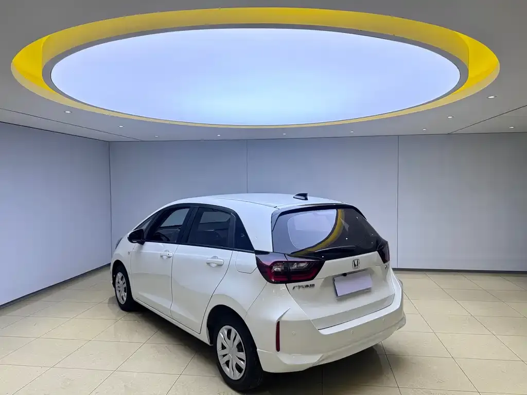 Honda Fit — фото 8