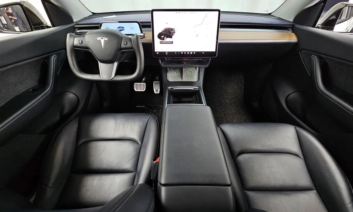 Tesla Model Y — фото 10