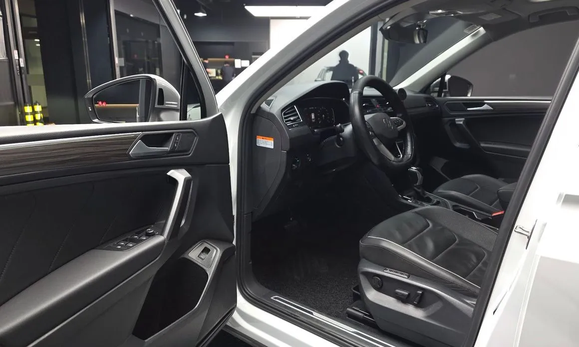 Volkswagen Tiguan — фото 7