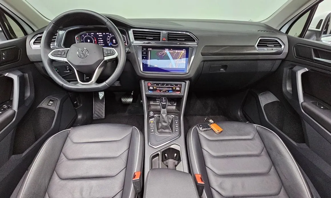 Volkswagen Tiguan — фото 7