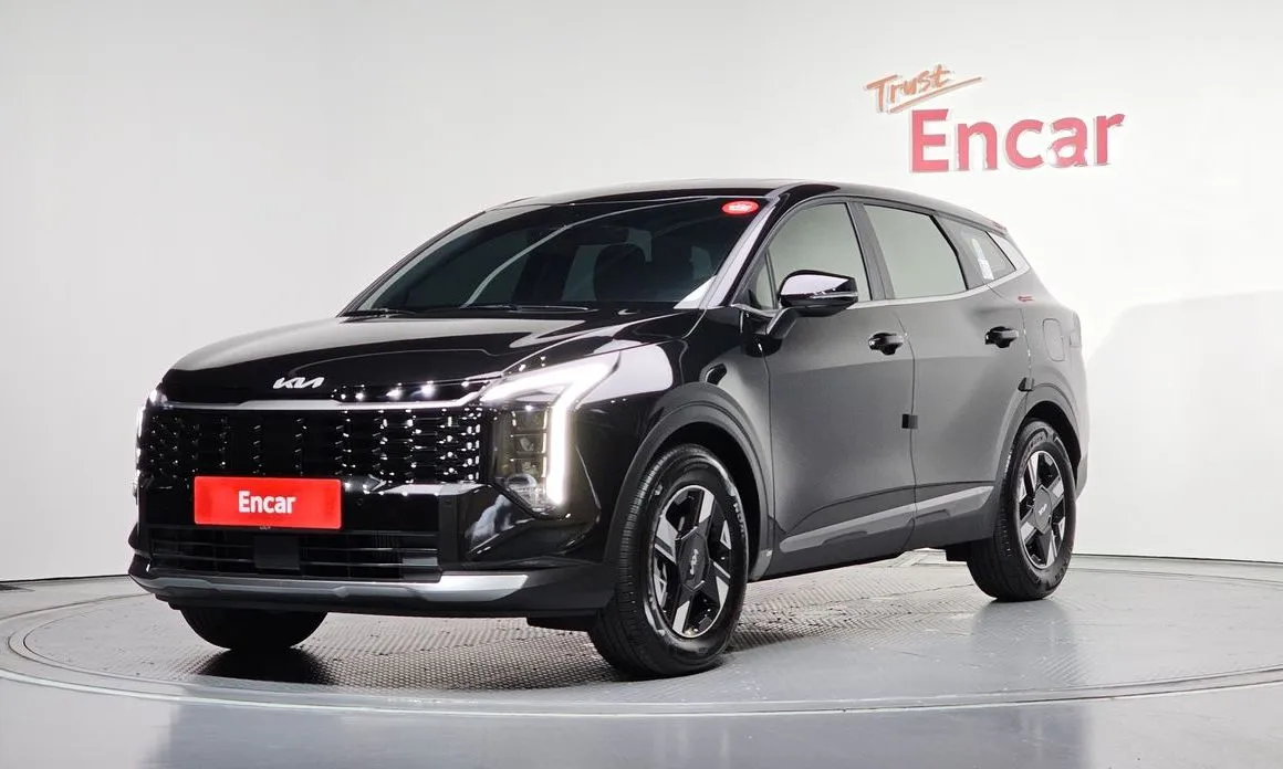 Kia Sportage — фото 1