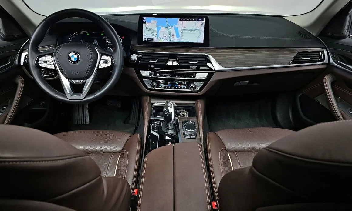 BMW 5-Series — фото 10
