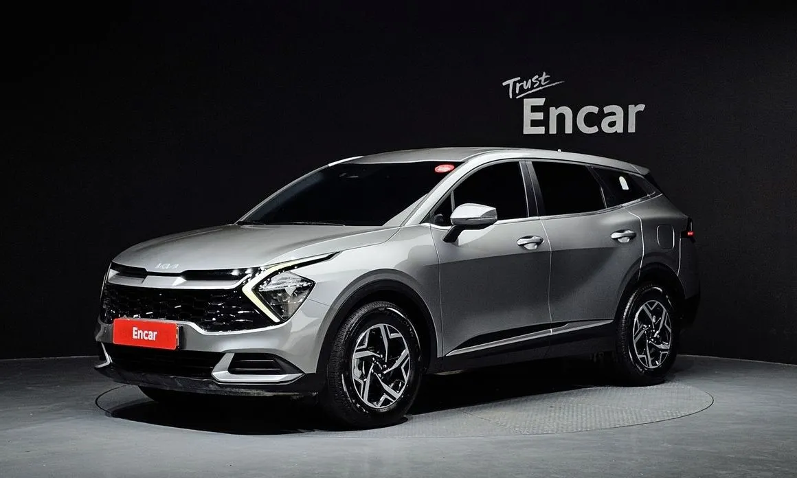 Kia Sportage — фото 1