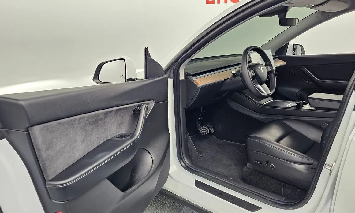 Tesla Model Y — фото 9