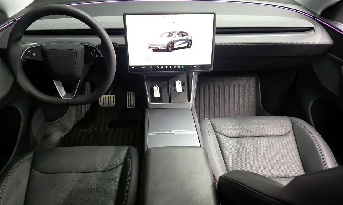 Tesla Model Y — фото 6