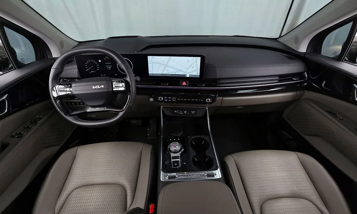 Kia Carnival — фото 8