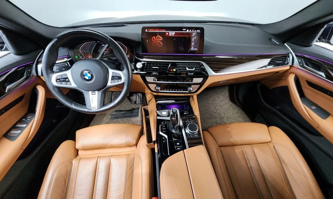 BMW 5-Series — фото 10