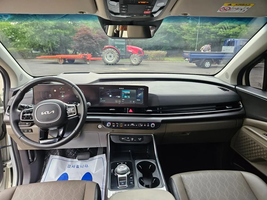 Kia Carnival — фото 10