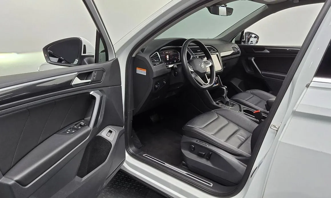 Volkswagen Tiguan — фото 7