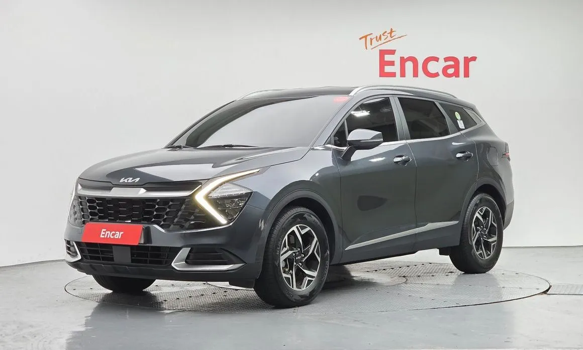 Kia Sportage — фото 1