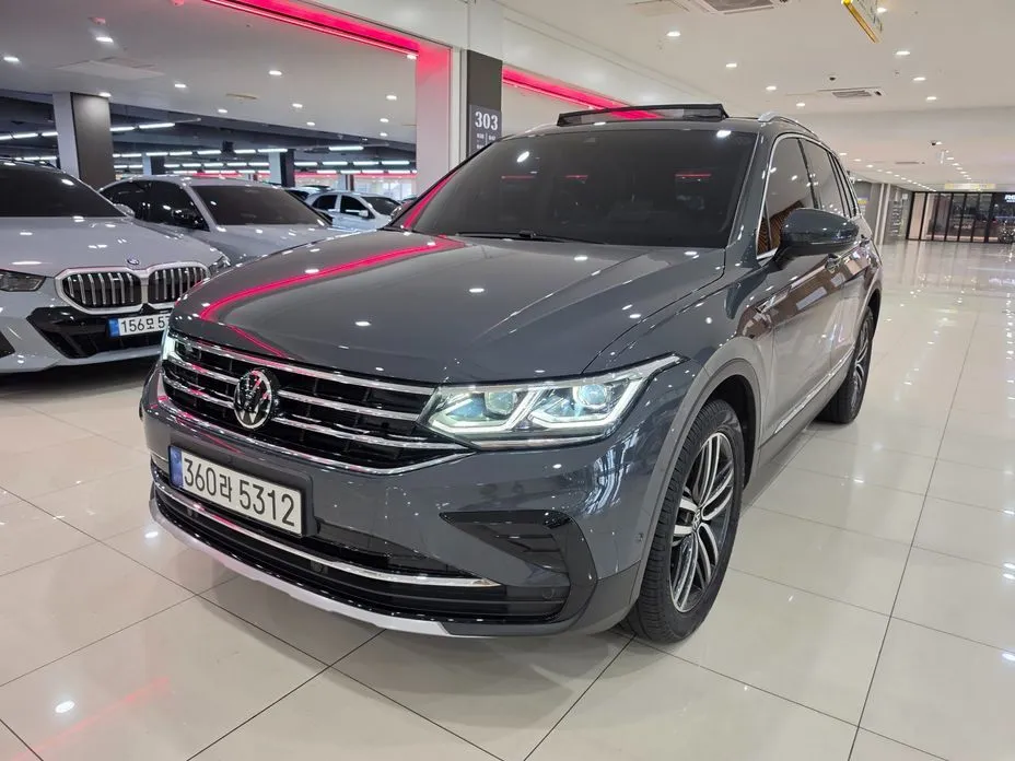 Volkswagen Tiguan — фото 1