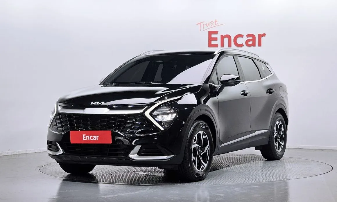 Kia Sportage — фото 1
