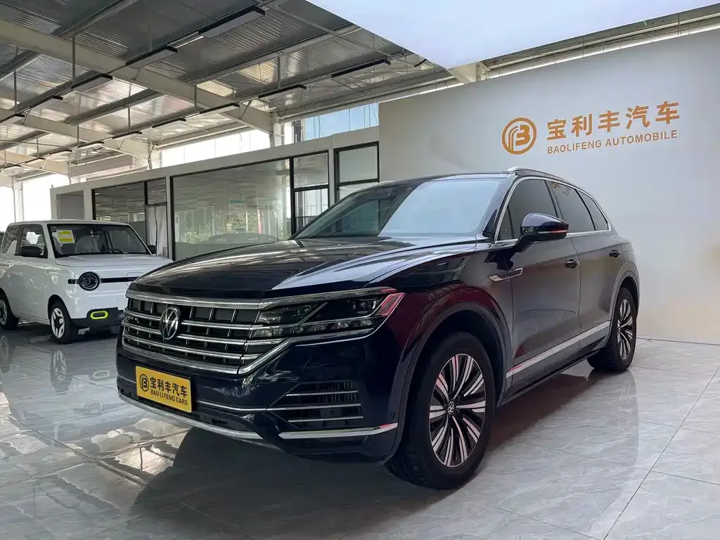 Volkswagen Touareg New Energy — фото 1