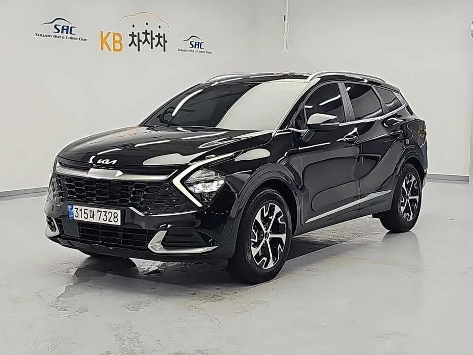 Kia Sportage — фото 1