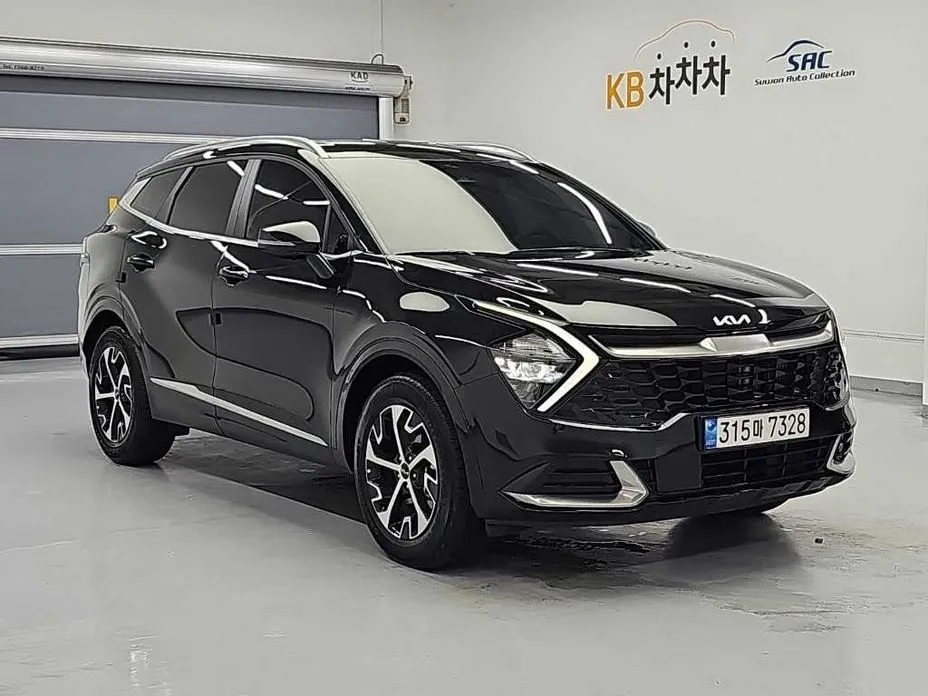 Kia Sportage — фото 5