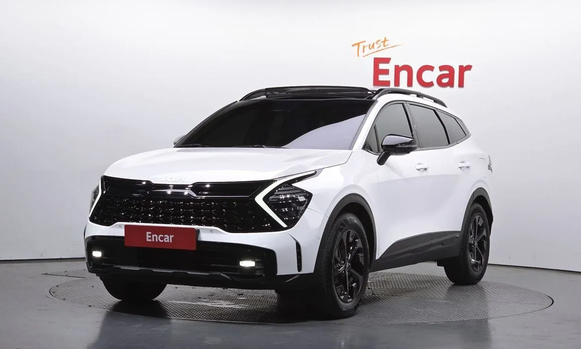 Kia Sportage — фото 1