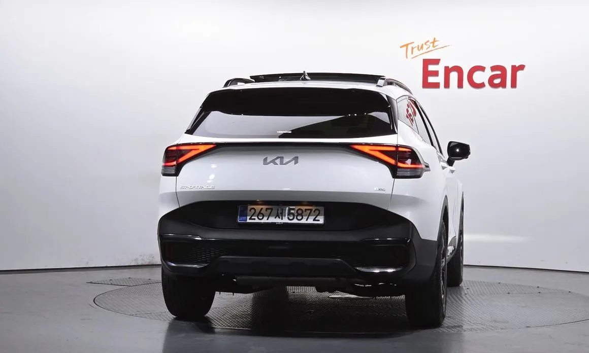 Kia Sportage — фото 7