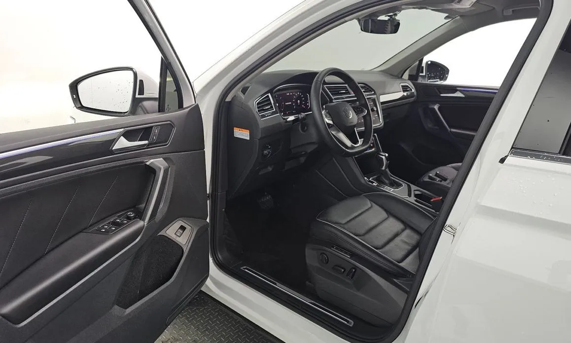Volkswagen Tiguan — фото 6