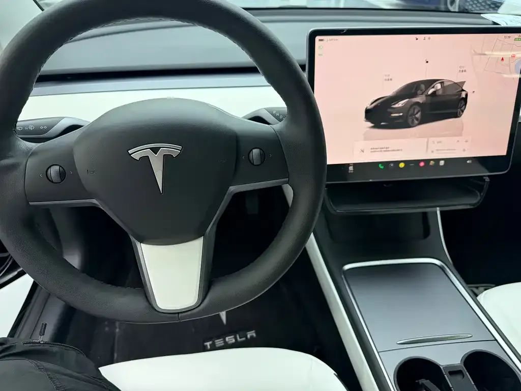 Tesla Model 3 — фото 8