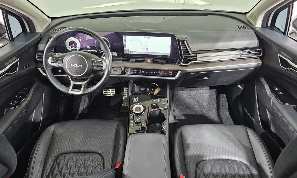 Kia Sportage — фото 10