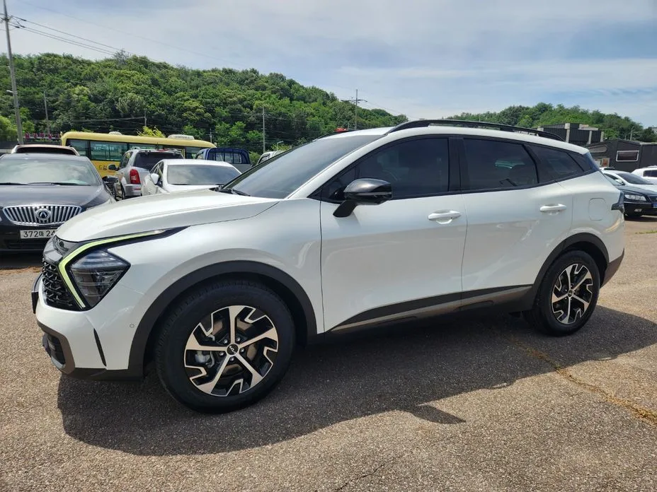 Kia Sportage — фото 1
