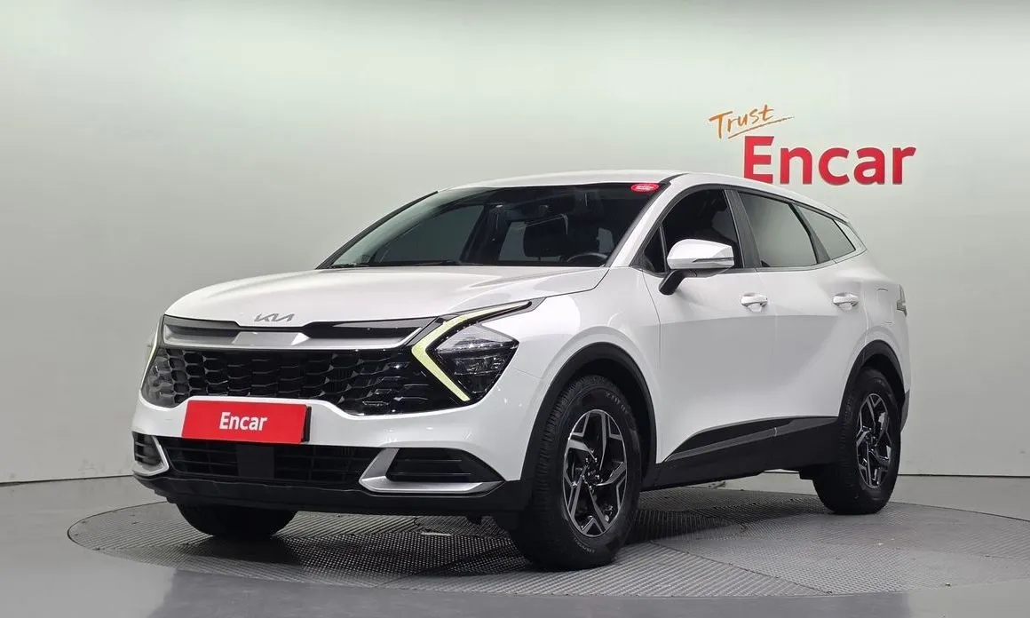 Kia Sportage — фото 1