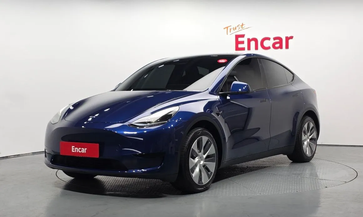 Tesla Model Y — фото 1