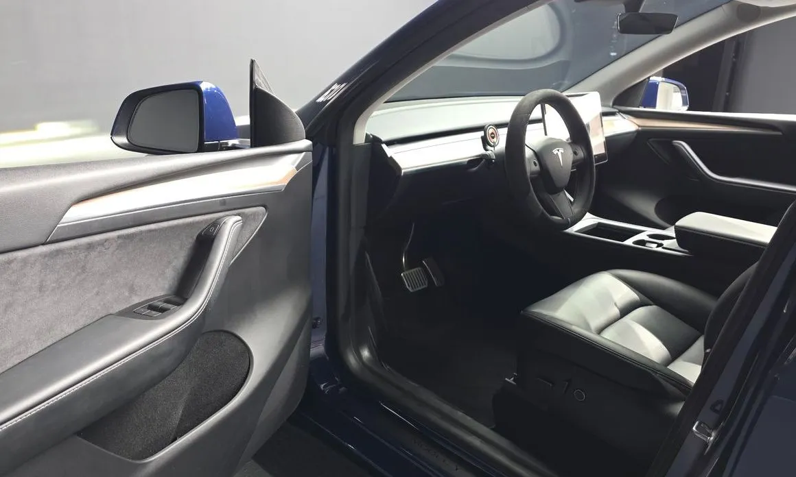 Tesla Model Y — фото 7
