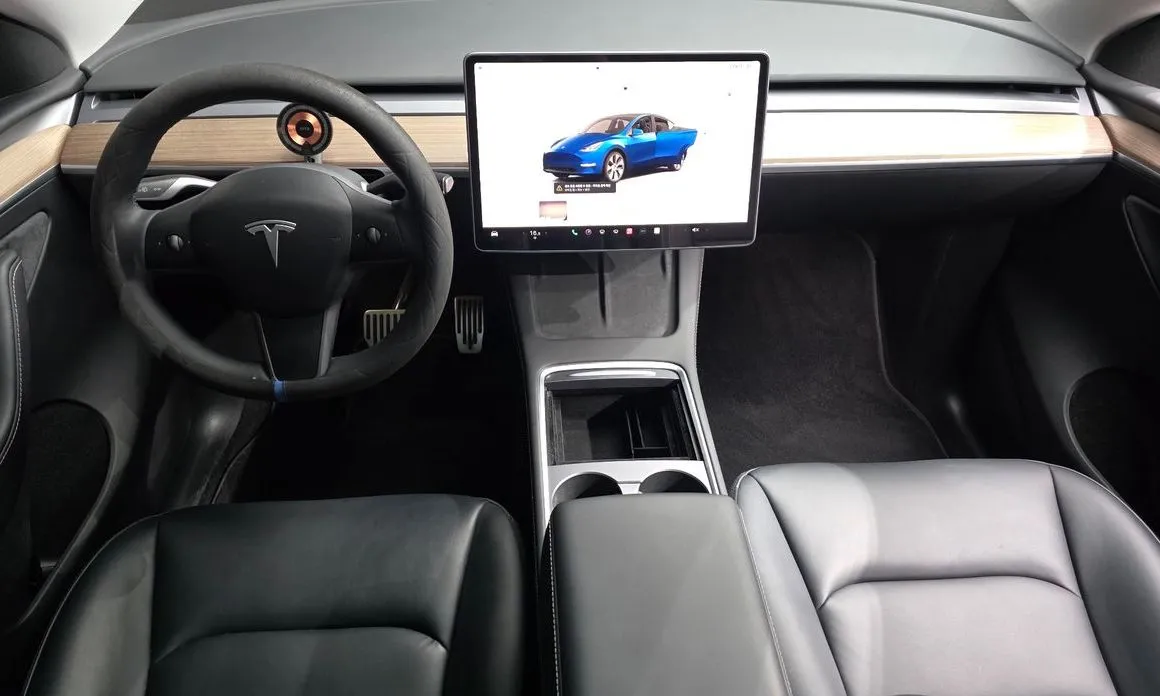 Tesla Model Y — фото 10