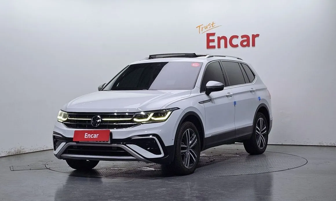 Volkswagen Tiguan — фото 1