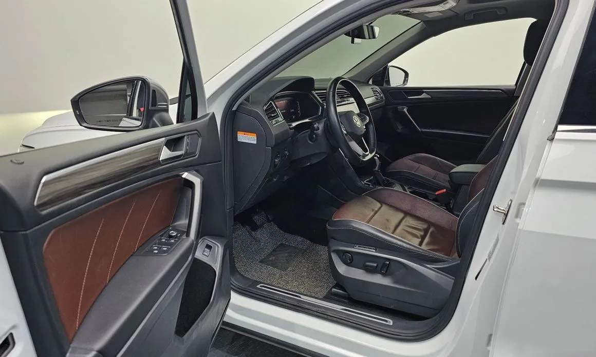 Volkswagen Tiguan — фото 6
